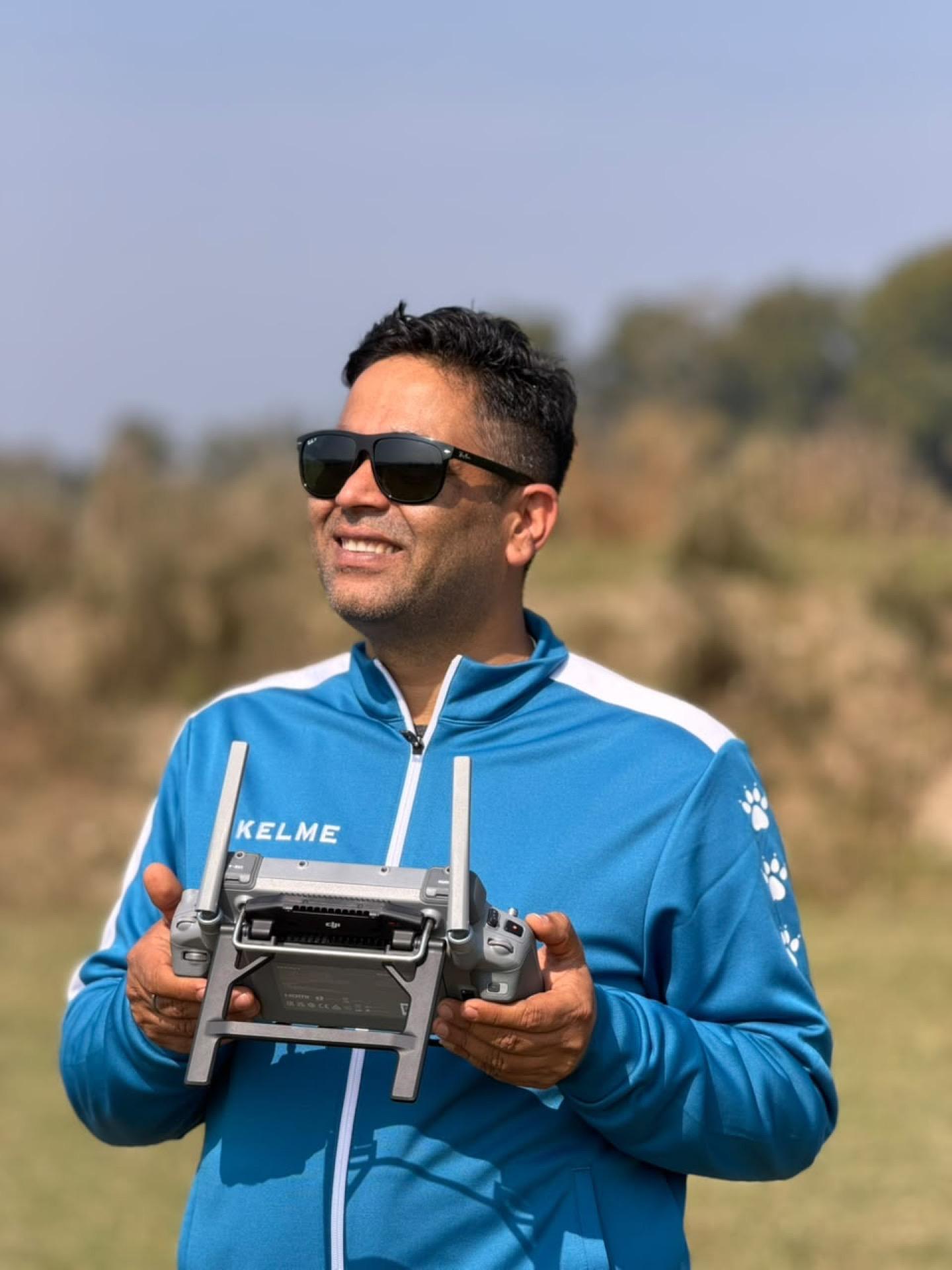 Pilot tracking a drone in flight during data acquisition